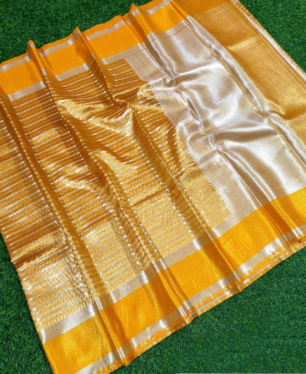 YELLOW SEMI TISSUE SILK WITH ZARI STRIP GARHWAL BORDER