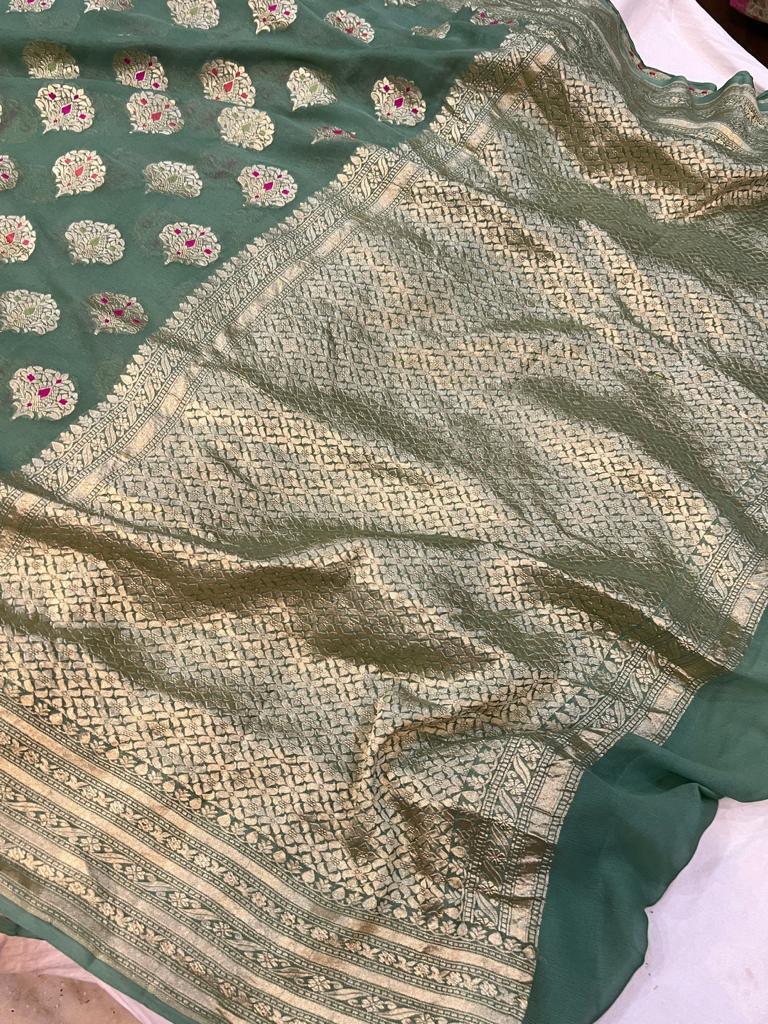 PISTA GREEN SEMI GEORGEETE SAREE WITH MEENA BUTTTA