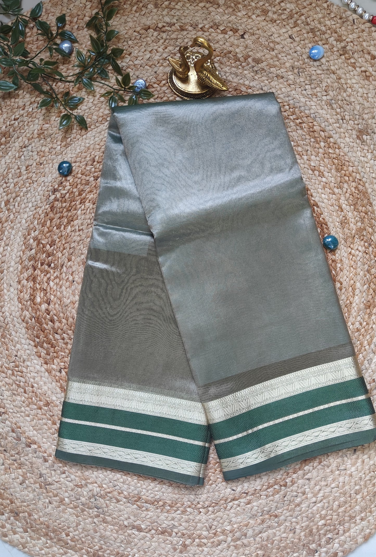 GREEN SEMI TISSUE SILK SAREE WITH GARHWAL BORDER