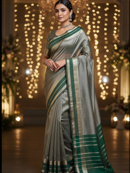 GREEN SEMI TISSUE SILK SAREE WITH GARHWAL  BORDER