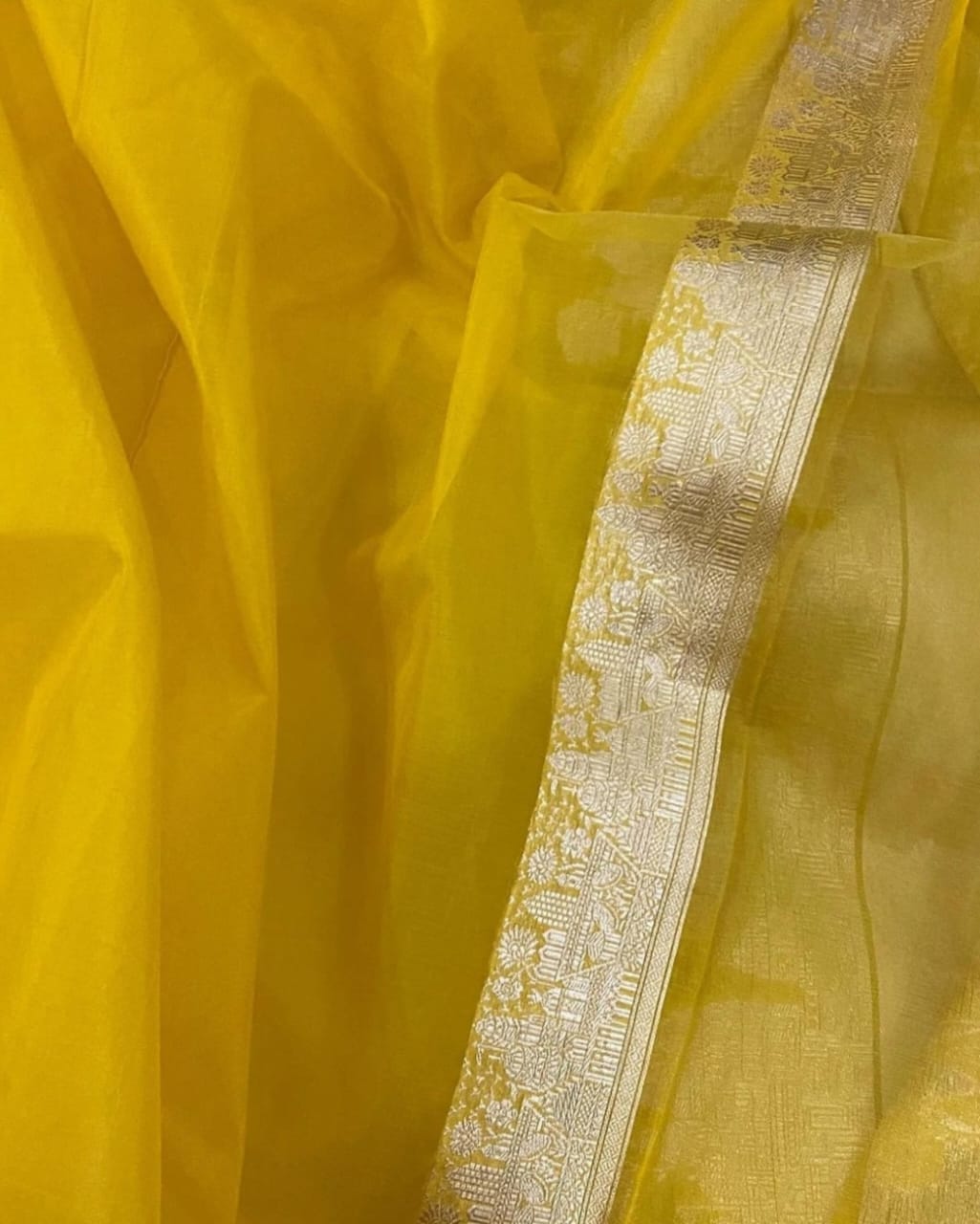YELLOW ORGANZA SAREE WITH ZARI WEAVED TEMPLE BORDER