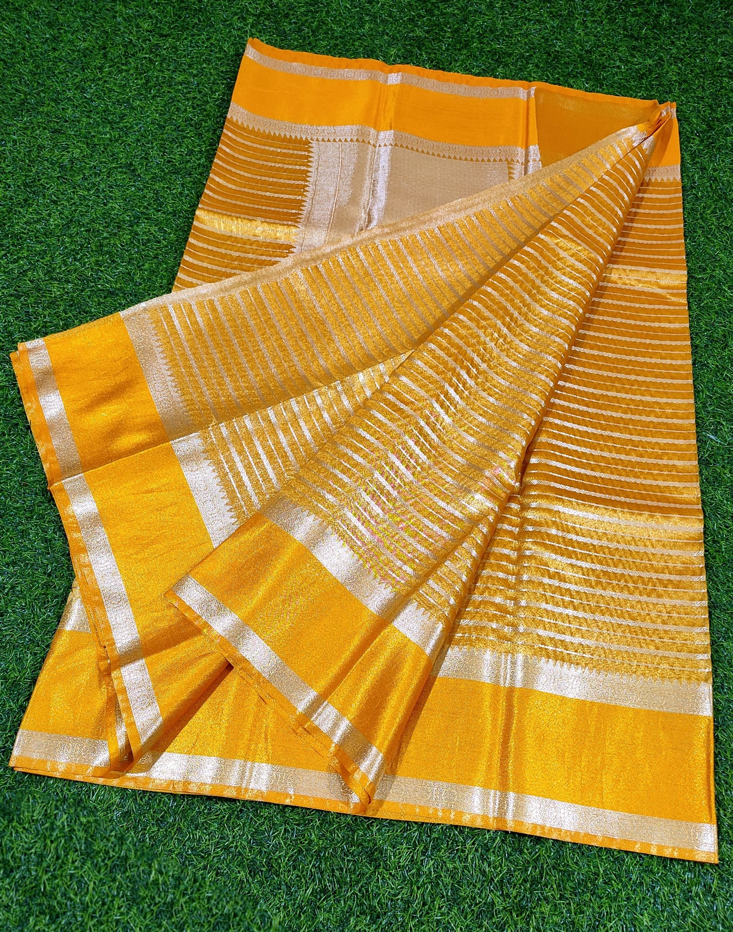 YELLOW SEMI TISSUE SILK WITH ZARI STRIP  GARHWAL BORDER