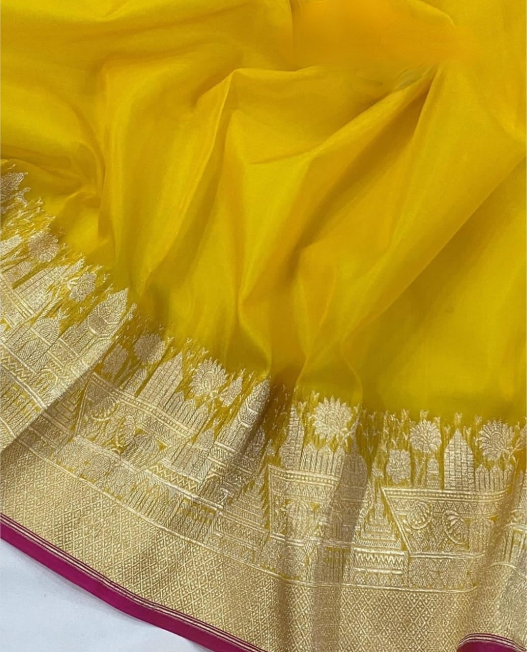 YELLOW ORGANZA SAREE WITH ZARI WEAVED TEMPLE BORDER