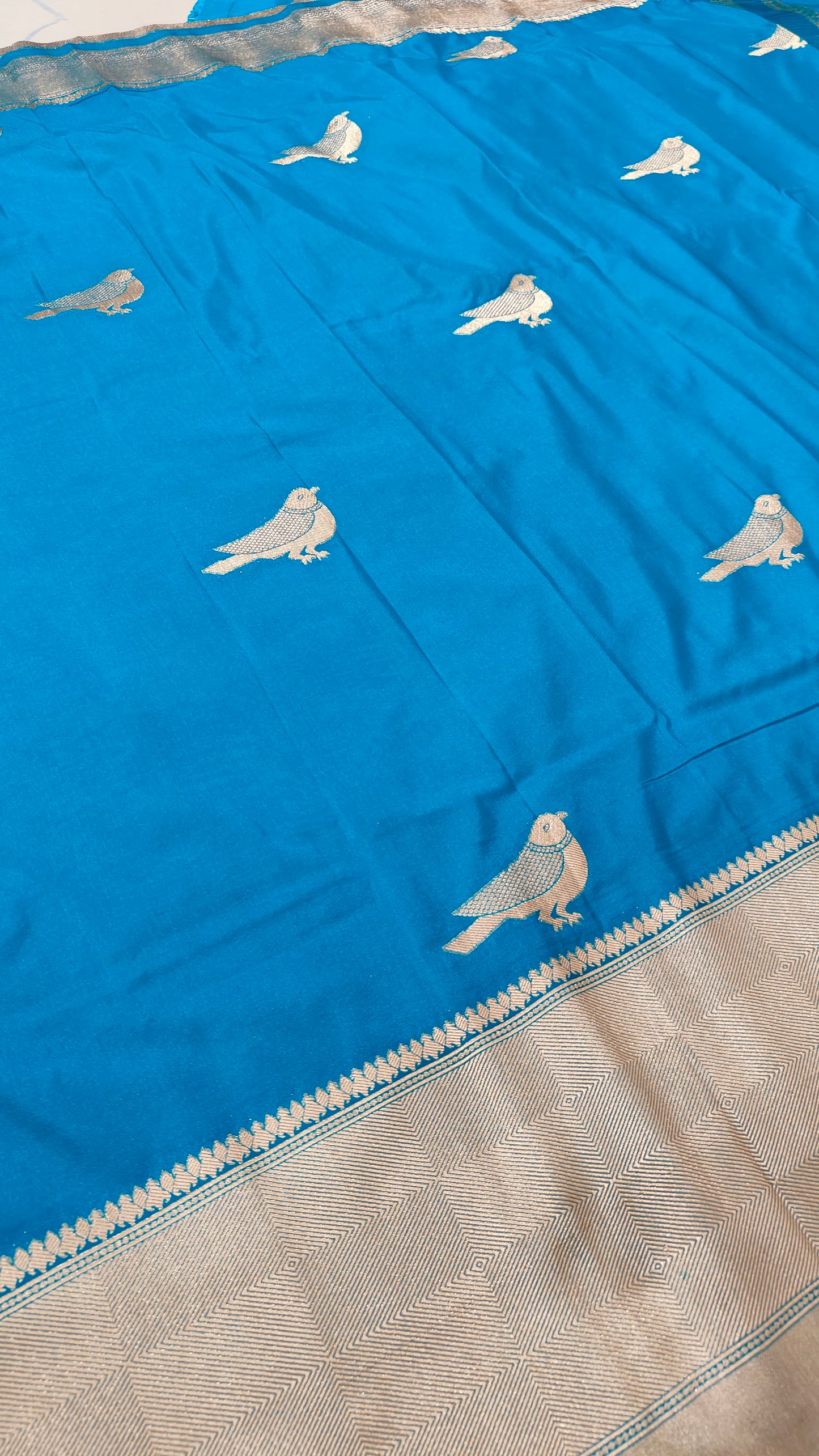 SKY BLUE CRAPE SILK SAREE WITH BIRD MOTIF